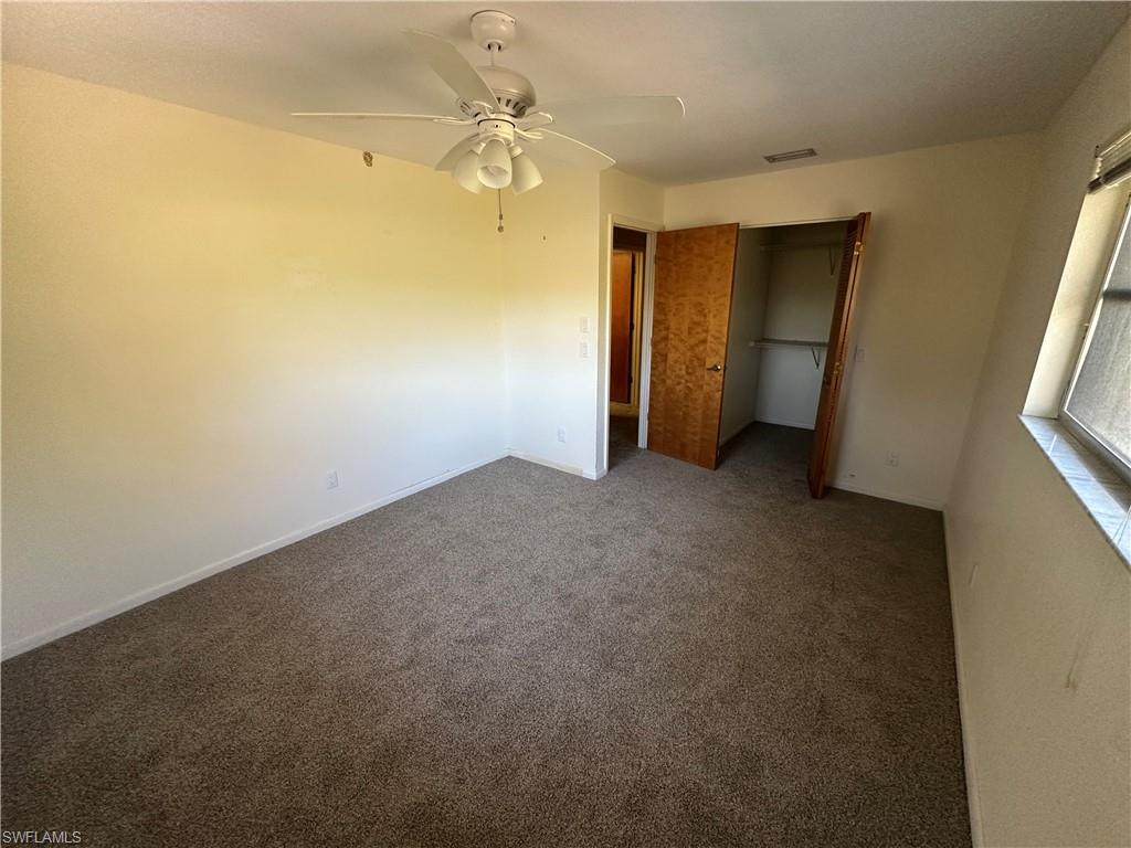 Great flex room.  Primary bedroom to the left and view towards the kitchen.  Florida room to the right,