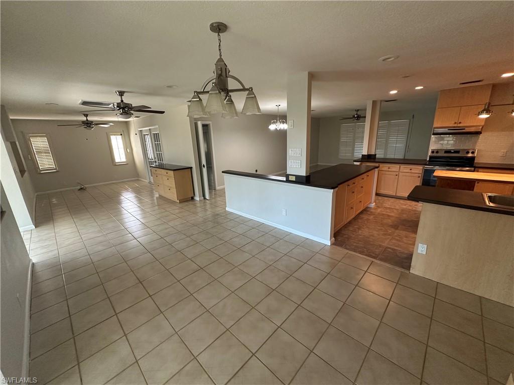 Overview of dining area, kitchen and living room