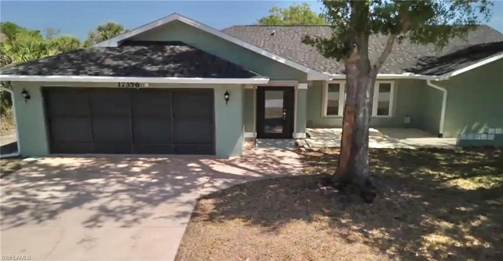 Waterfront home with one bridge to Charlotte Harbor and boat your way to the Gulf