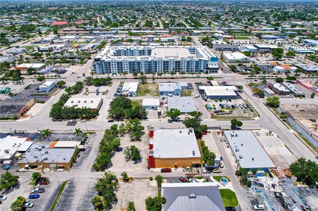 Ariel From South Looking North.  New Housing Project w/ 327 NEW UNITS  On Cape Coral Pkwy Is Walkable. On Cape Coral Pkwy.