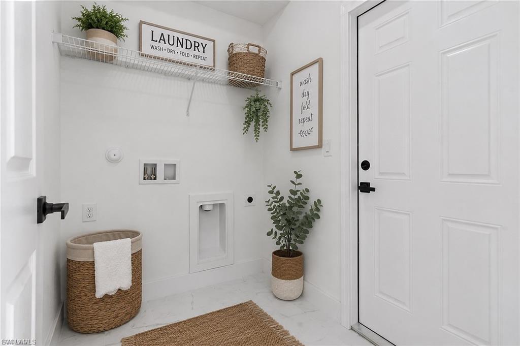 White panel doors with matte black hardware, white walls, and white wire shelving