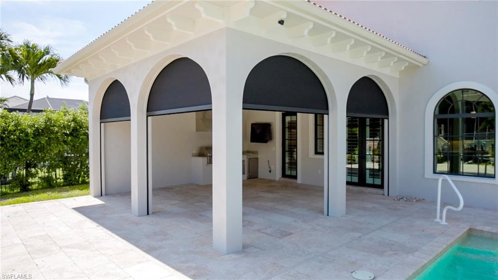View of patio / terrace featuring an outdoor pool
