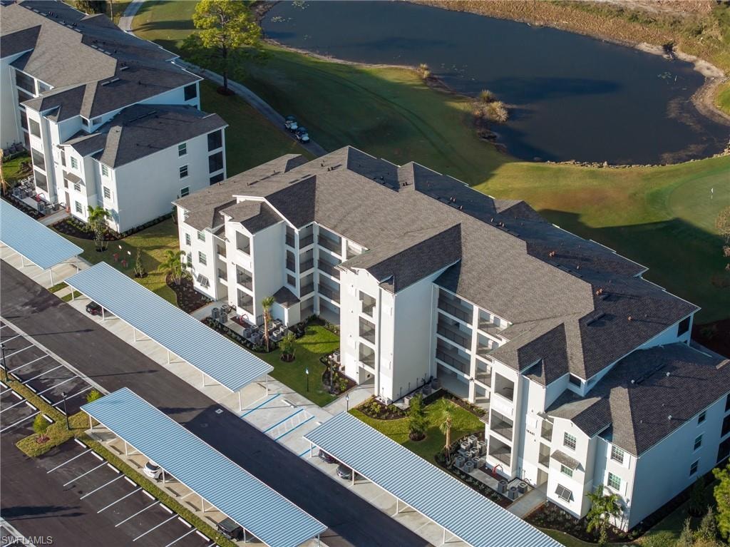 Bird's eye view of a nearby body of water and a golf club
