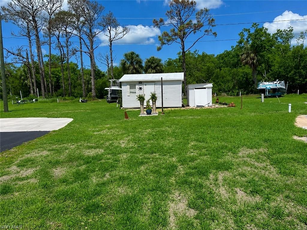 View of lot featuring a storage unit