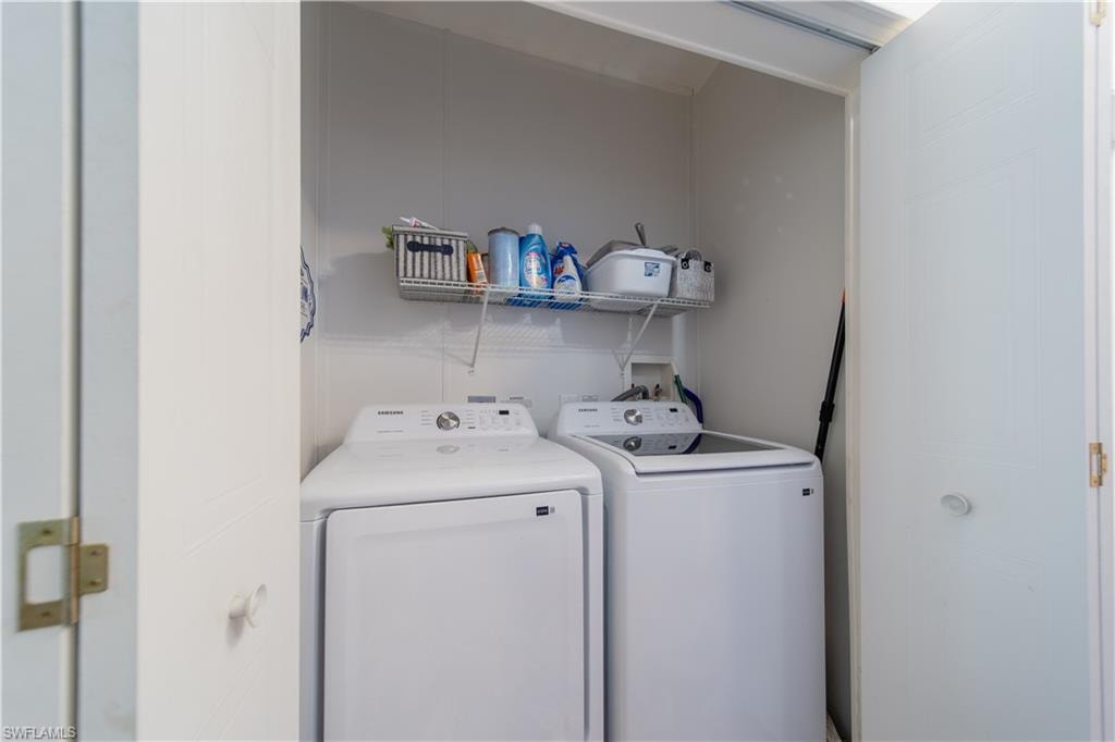 Laundry area featuring washer and clothes dryer