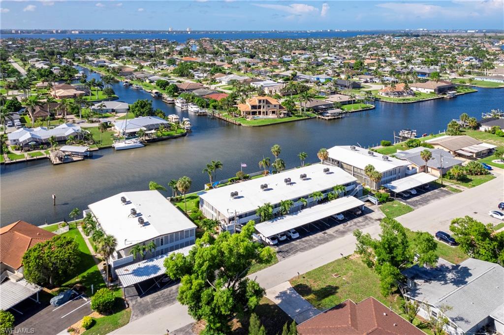 Aerial view of residential area with a nearby body of water
