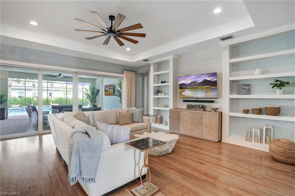 Custom entertainment center.  Built in shelves, cool, coastal vibes.