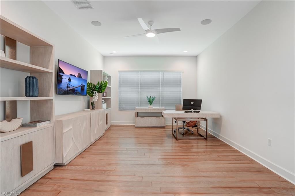 Spacious office off the foyer