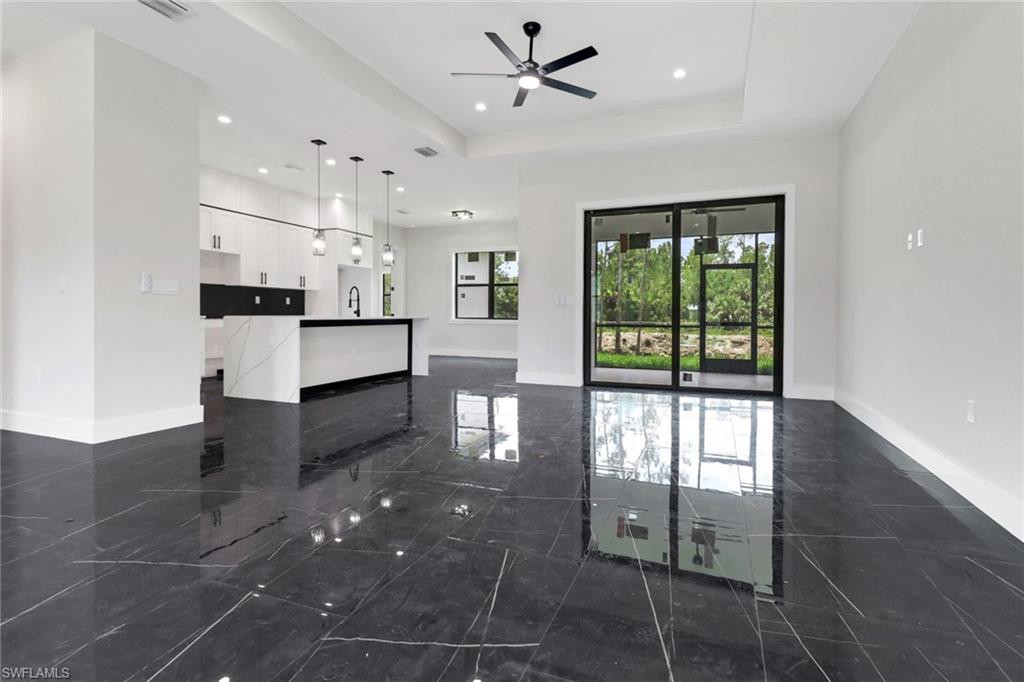 Inviting open concept great room and kitchen area makes entertaining a breeze