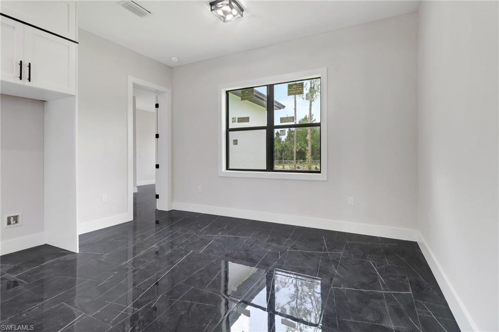 Breakfast area off the kitchen featuring tile flooring