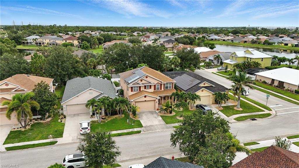 Aerial view of residential area with a large body of water