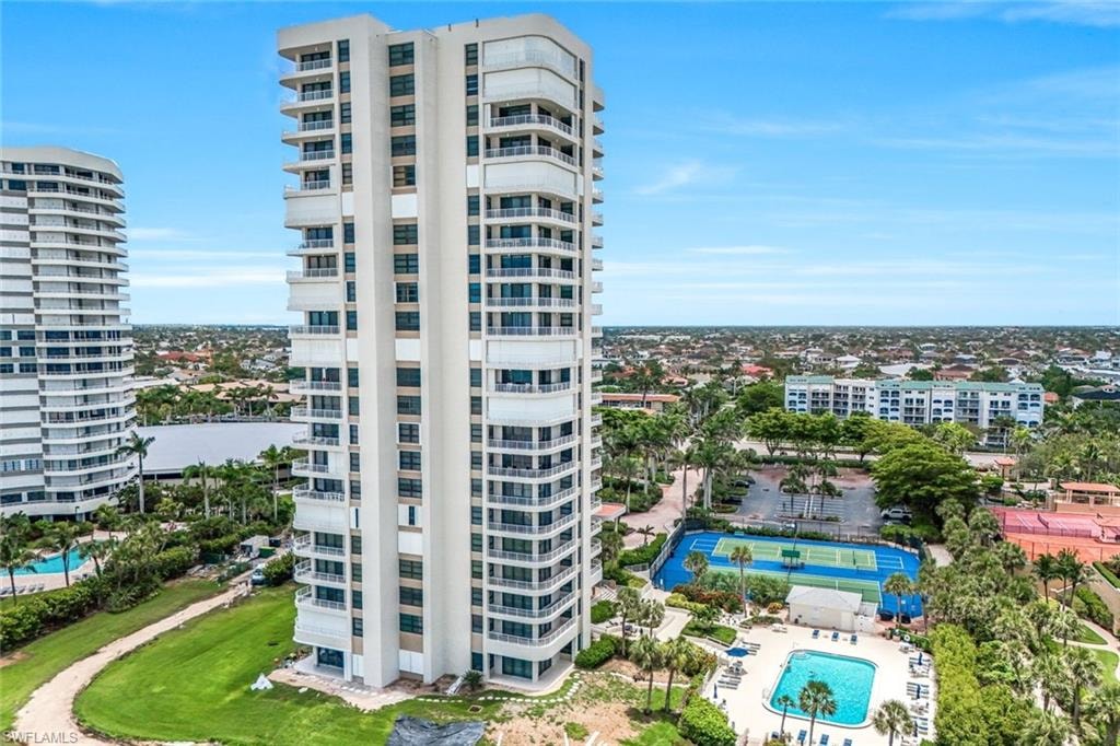 View of apartment building / complex featuring a city view