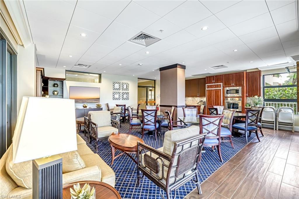 Living room featuring wood finished floors and recessed lighting