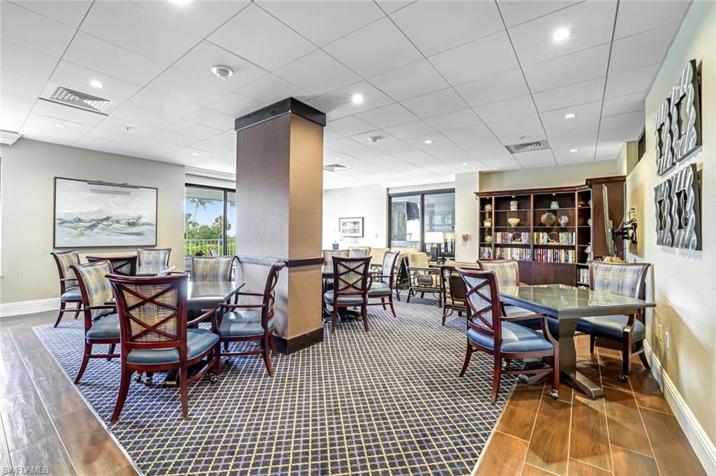 Dining room with baseboards and wood finished floors
