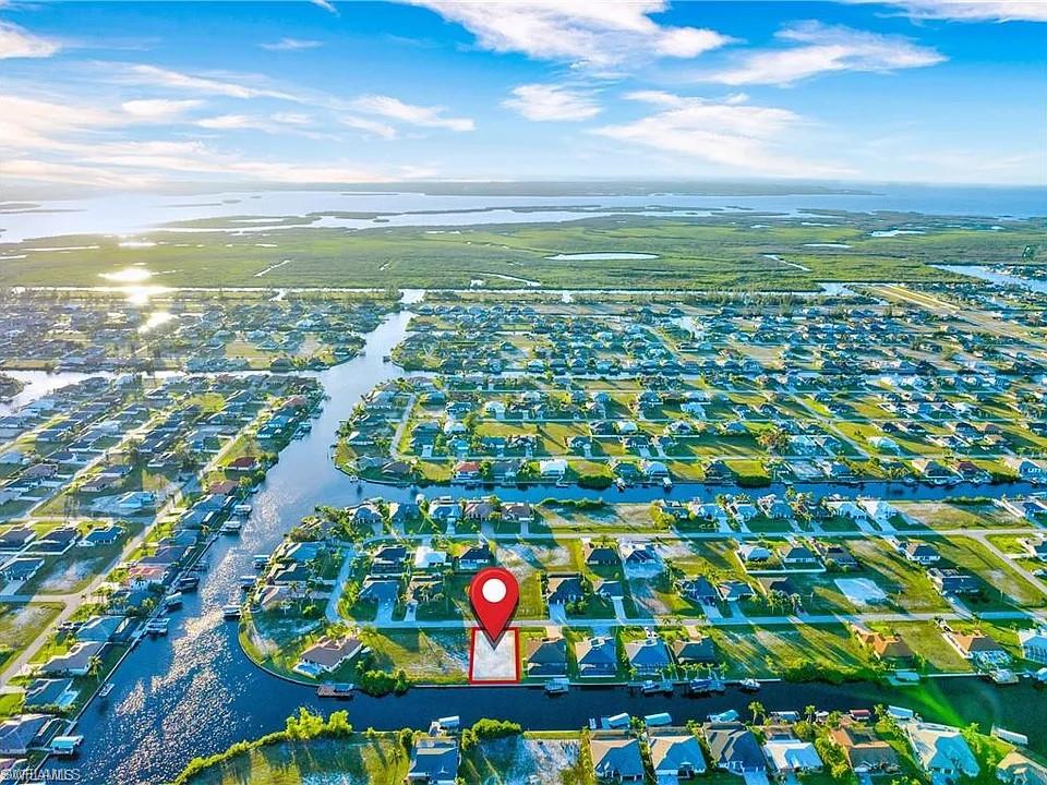 View of property location with a nearby body of water