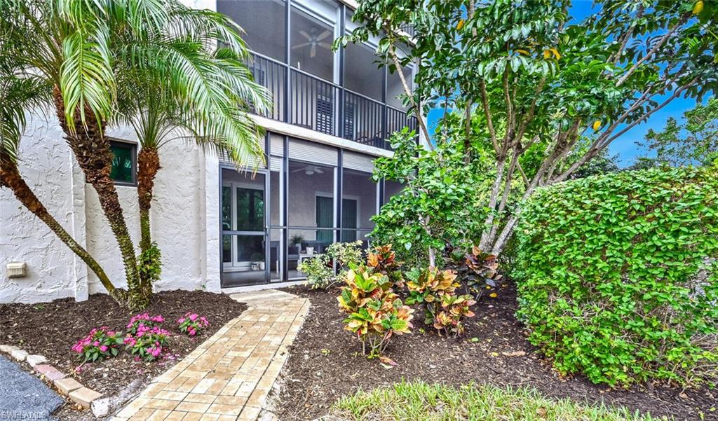 Walking through garden area to lanai