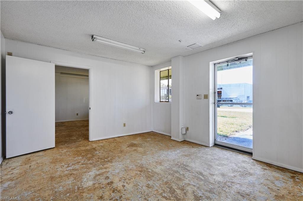 Spare room with a textured ceiling