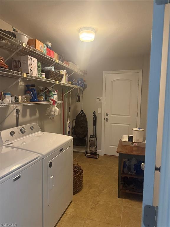 Laundry room with washing machine and dryer