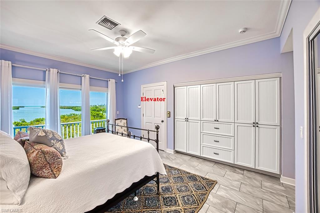 Bedroom with crown molding, access to exterior, a ceiling fan, and light marble finish flooring
