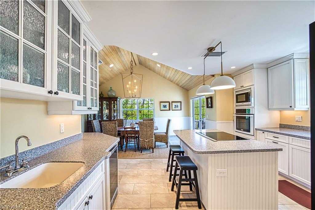 Kitchen With Wet Bar And Wine Cooler