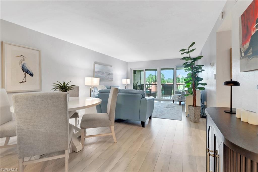 Living area with light wood finished floors
