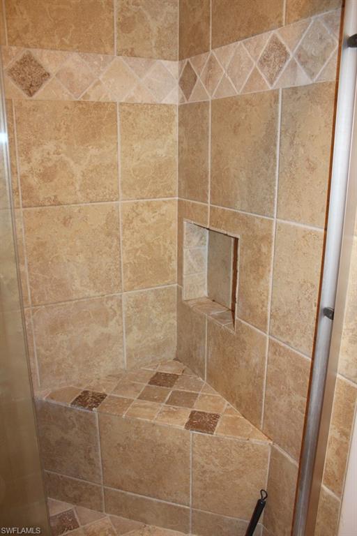 Bathroom view of tiled shower