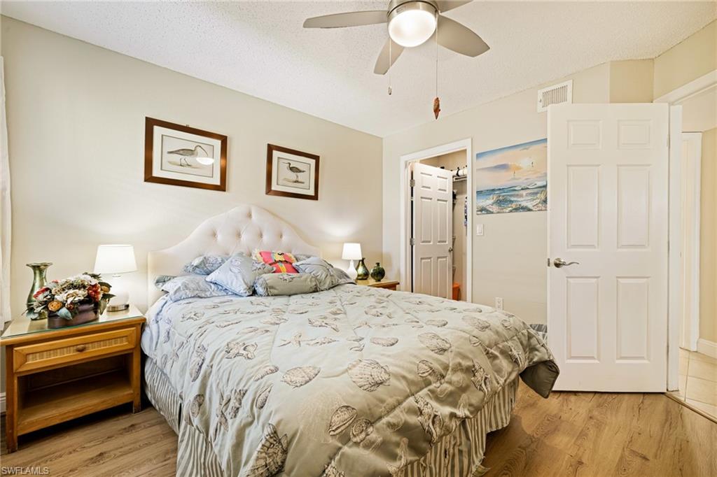 Bedroom featuring light wood-type flooring and ceiling fan