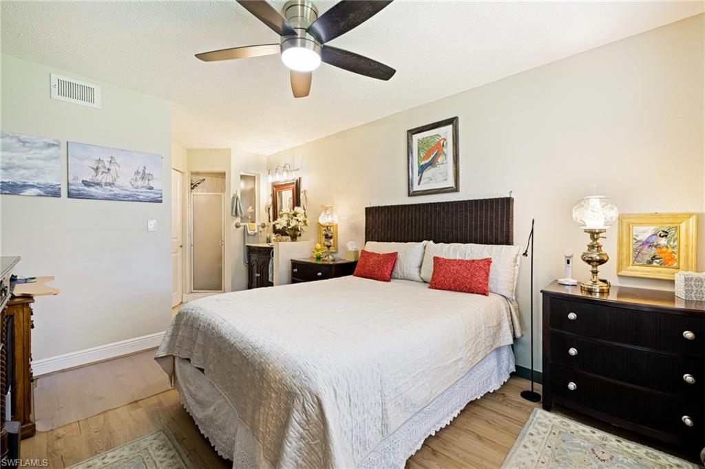 Bedroom featuring light wood-style floors and ceiling fan