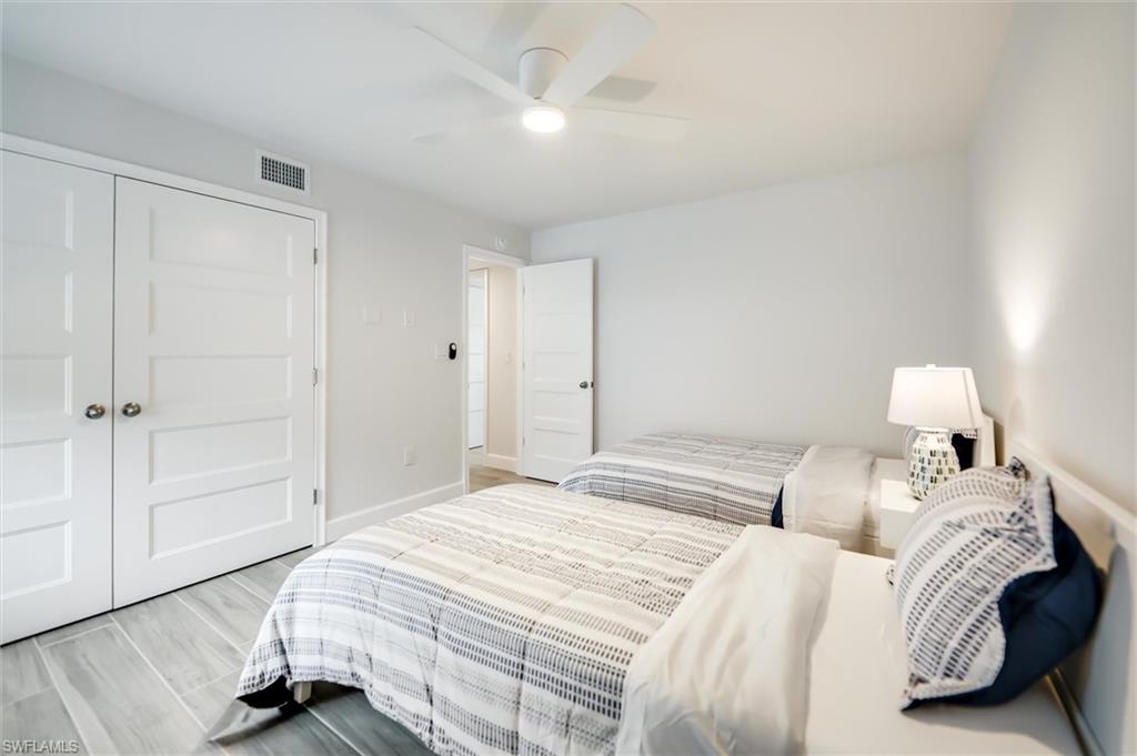 Bedroom featuring a closet and a ceiling fan