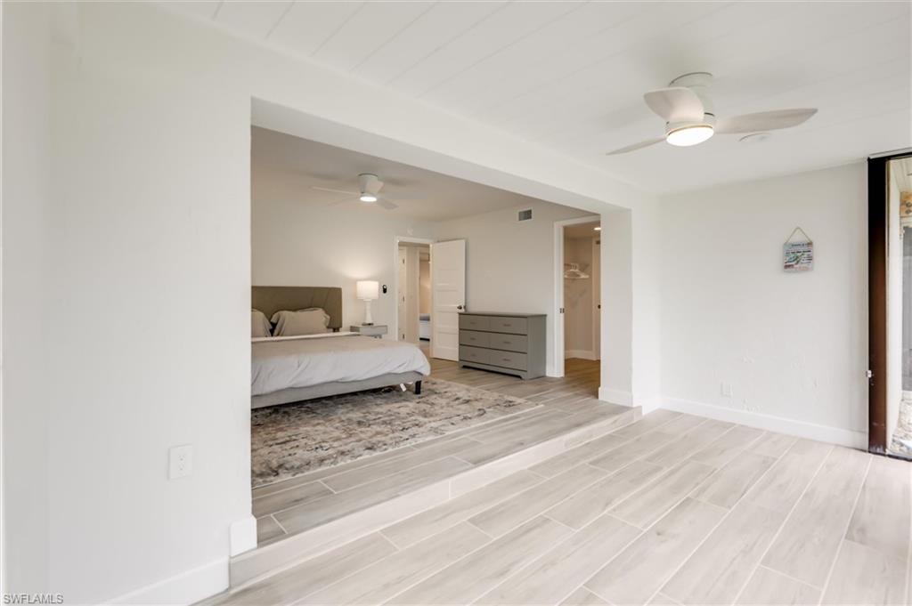Bedroom featuring light wood-style floors and ceiling fan