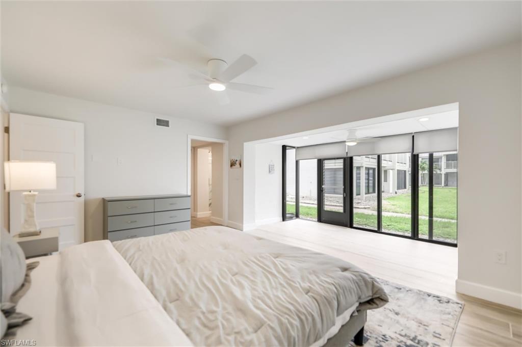 Bedroom featuring light wood-style floors and a ceiling fan