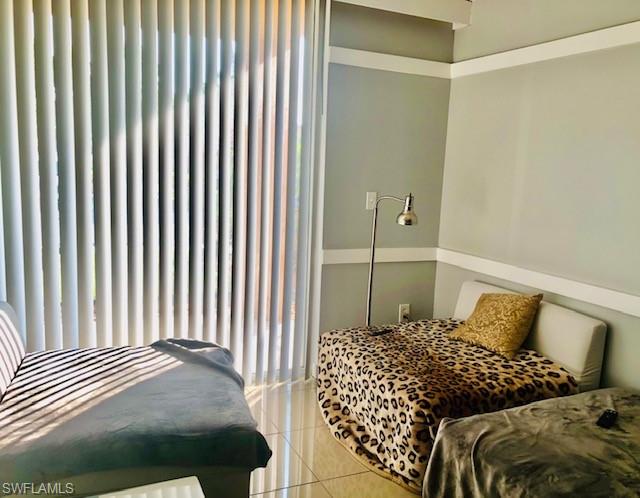 Bedroom featuring tile patterned floors