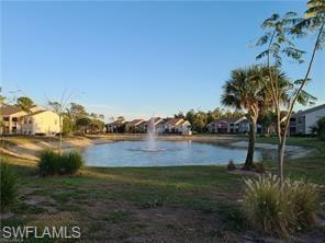 Water view featuring nearby suburban area