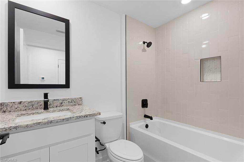 Full bath with vanity and  shower combination