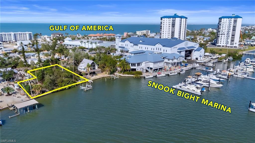 Talk about convenience!  Close to the Marina with restaurants, great Bay Access and just steps to the Gulf of America.  Virtually Edited Property Lines