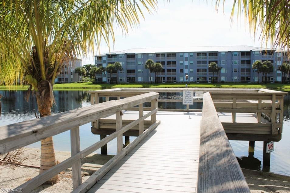 Dock featuring a water view