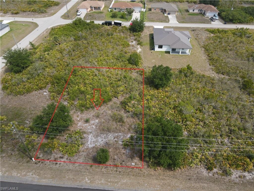 Aerial overview of property's location with property parcel outlined