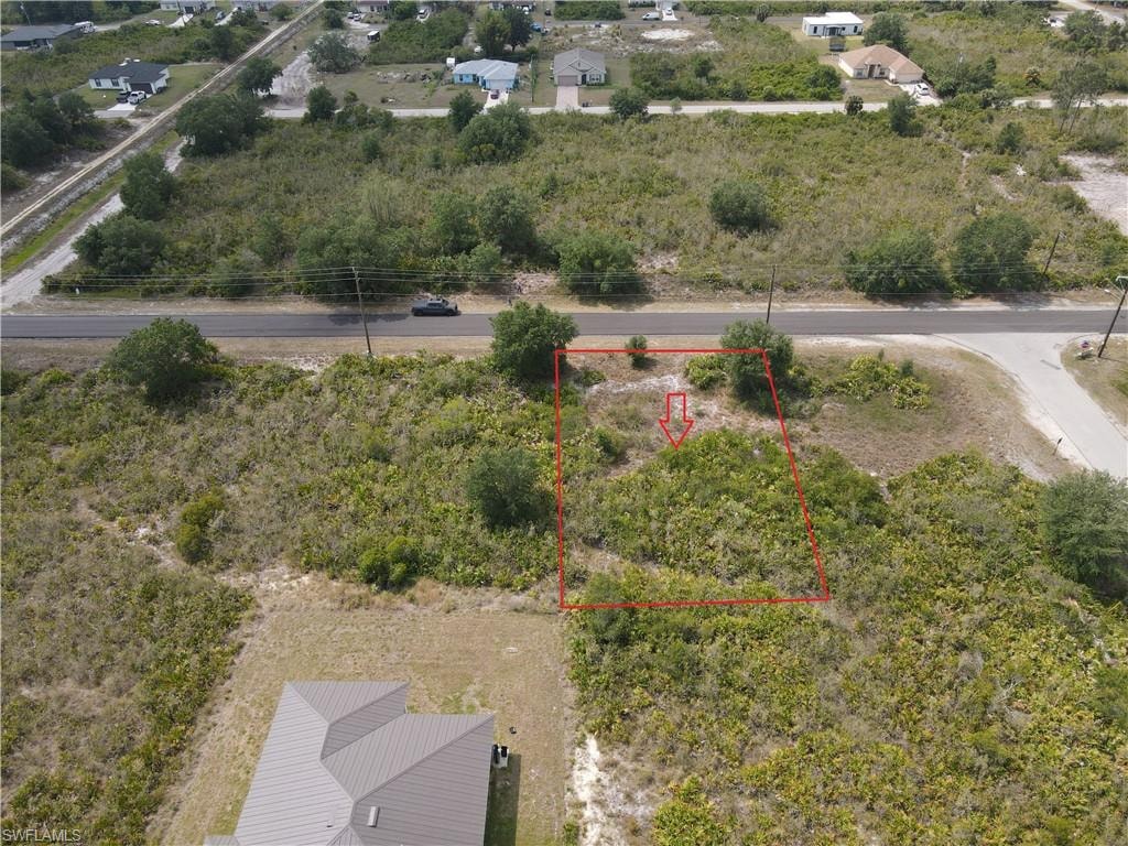 Aerial overview of property's location with property parcel outlined