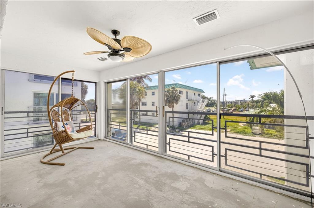 Great open space and view of the community pool area and beach.  Photo may be digitally enhanced