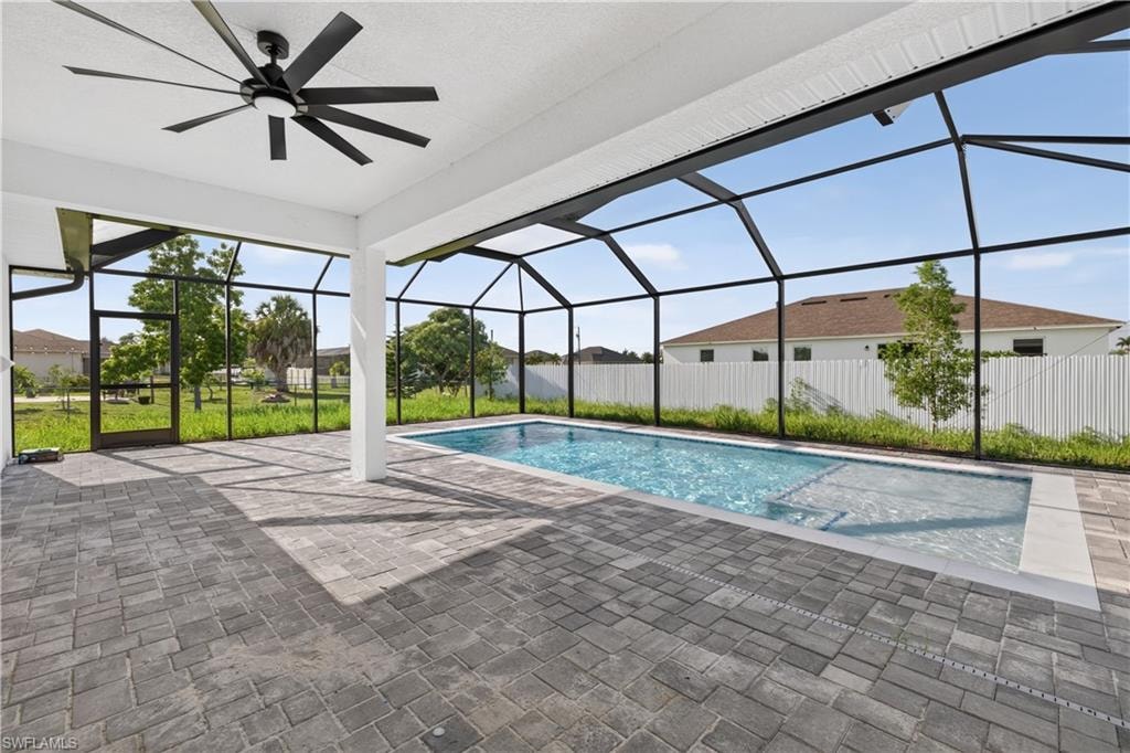 Neutral paint tones, tile flooring, and a modern ceiling fan