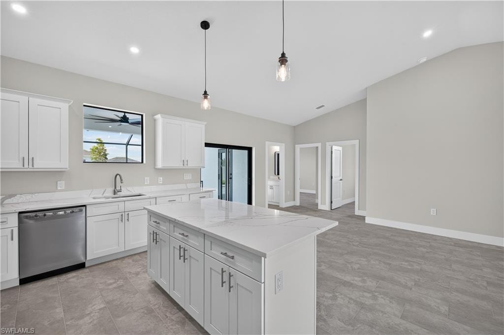 Spacious room featuring vaulted ceilings, recessed lighting, tile flooring, a black-framed window, and a black-framed door with frosted glass