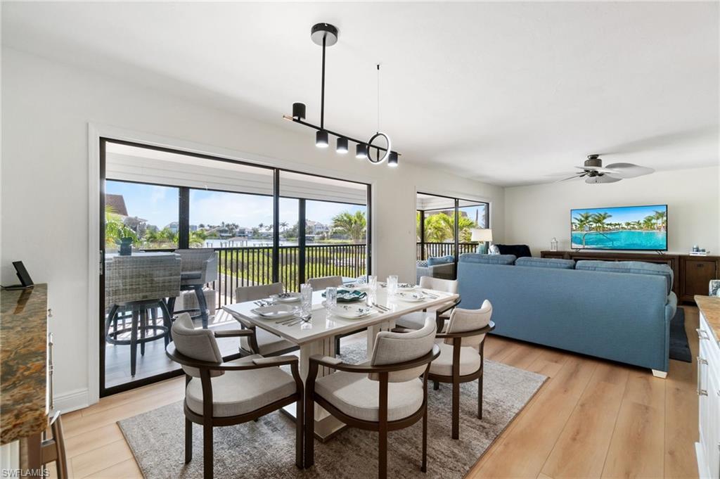 Dining room featuring plenty of natural light and light wood finished floors