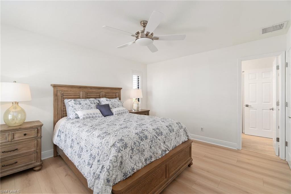 Bedroom featuring light wood finished floors and ceiling fan