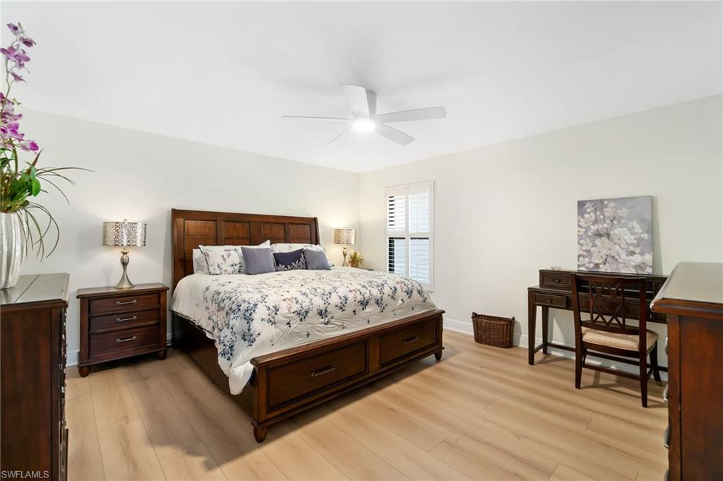 Bedroom featuring light wood-style floors and ceiling fan