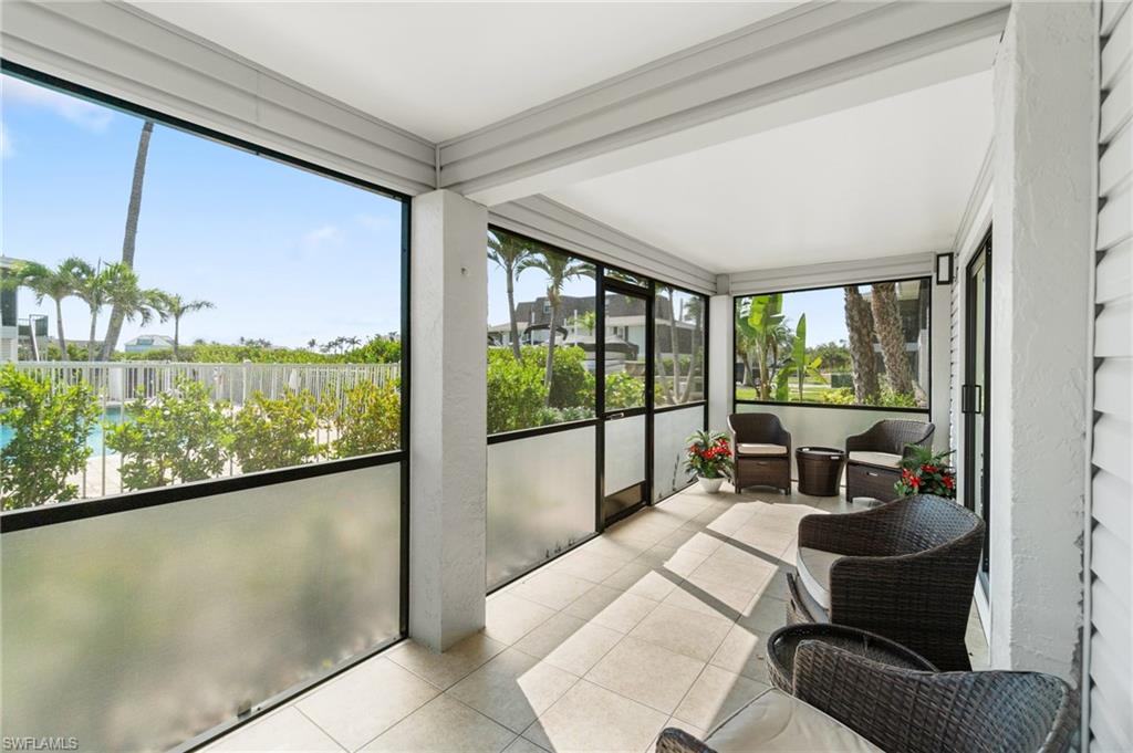 Sunroom with tile patterned floors