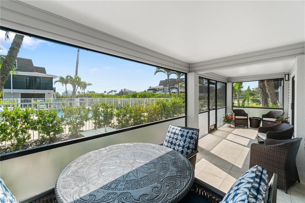 Sunroom with tile patterned flooring