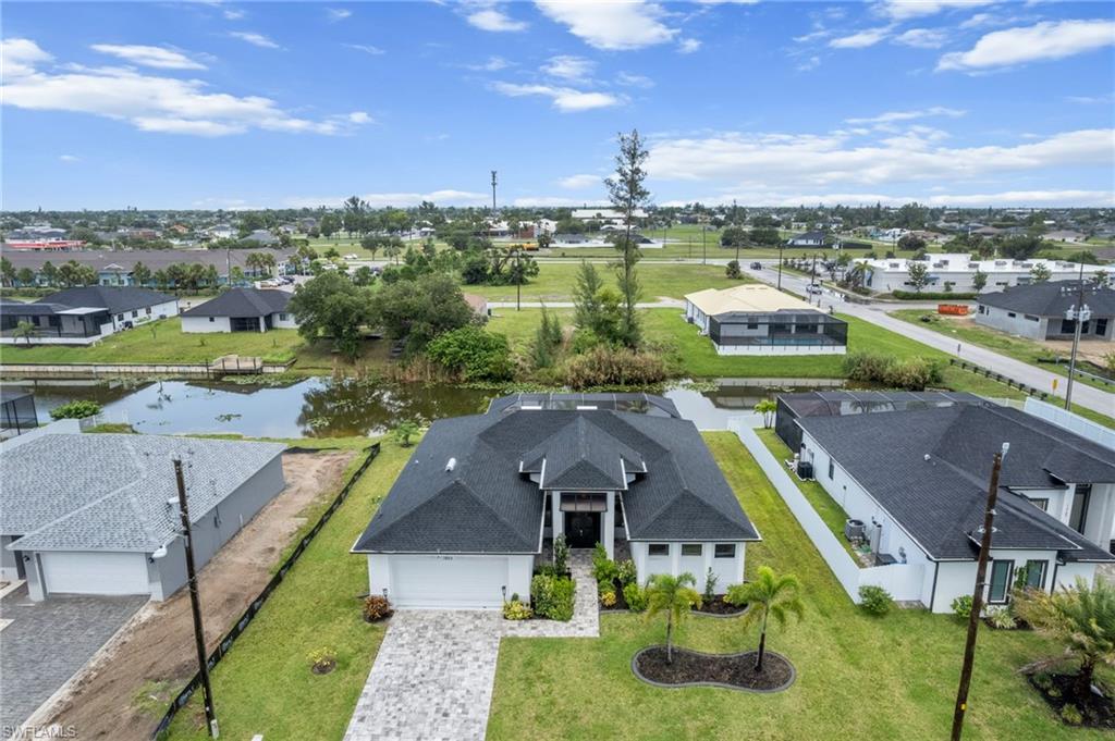 Aerial view of residential area with a large body of water