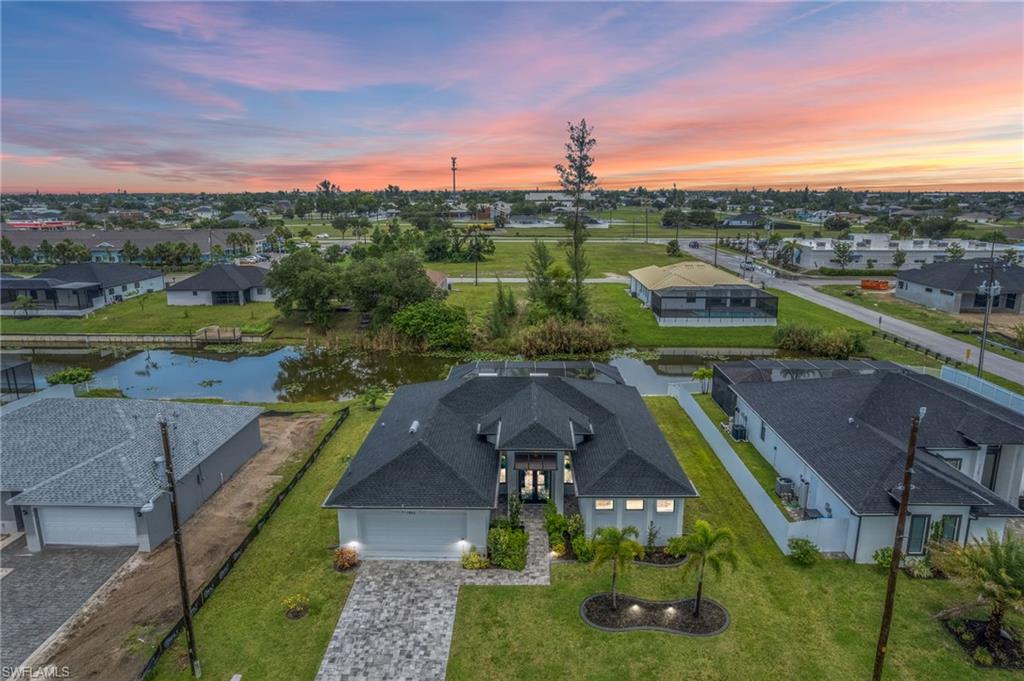Aerial view of residential area with a nearby body of water