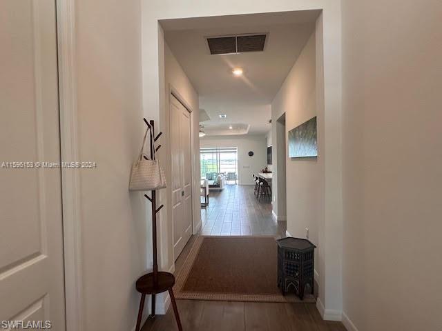 Hall featuring light hardwood / wood-style floors
