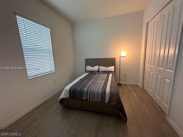 2nd Bedroom featuring hardwood / wood-style flooring and a closet